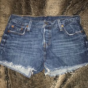 SOLD Levi Mid Rise Jean Shorts